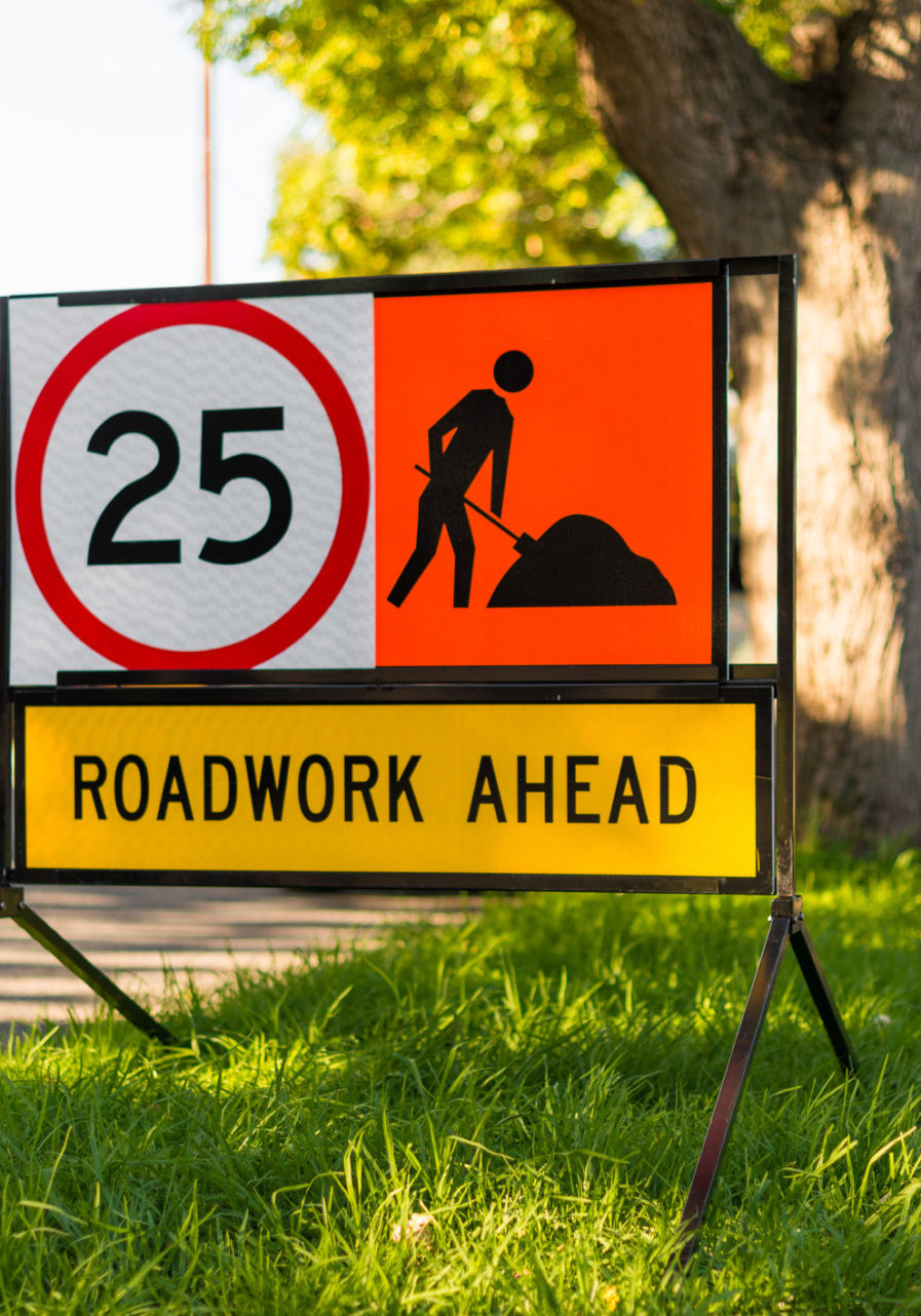 Road works 25 speed limit warning sign suburban side street