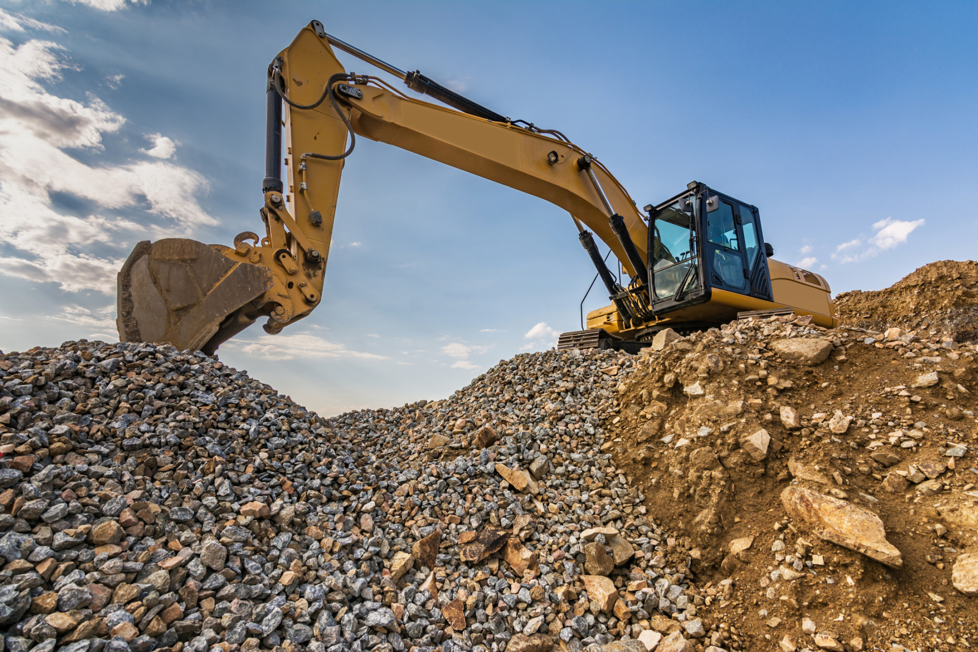Excavator Working On A Building Site Heavy machinery for construction